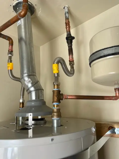 Water heater installation and plumbing repair in Woodland Acres